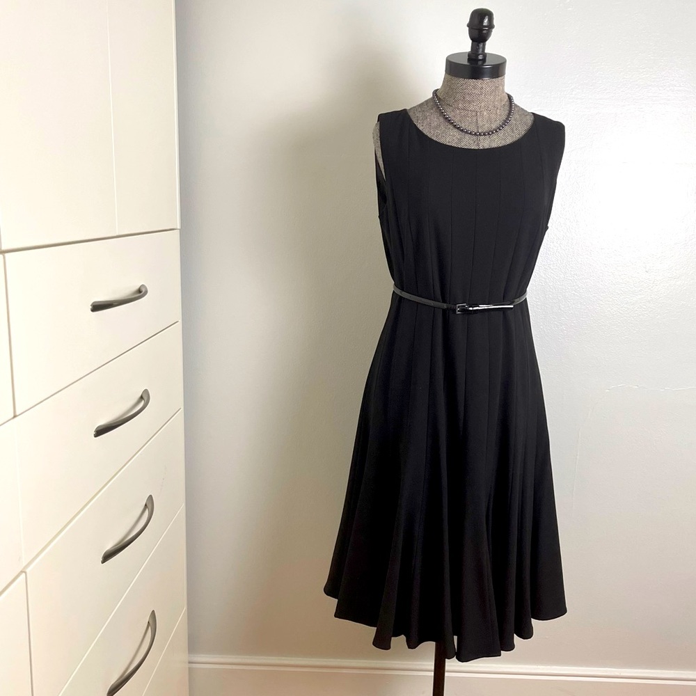 Lovely black color Calvin Klein dress. New without tag. Classical style.